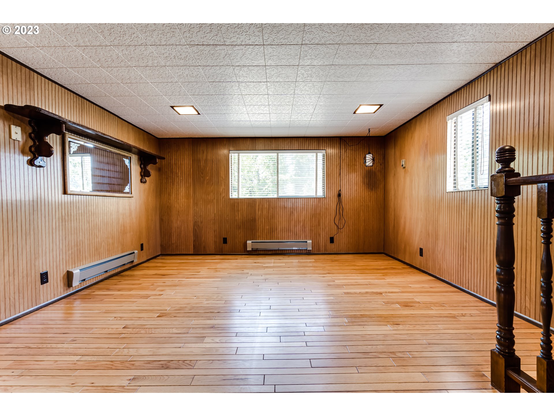 88240 Millican Road Springfield, OR 97478 - Photo 7 of 15 a view of an empty room with wooden floor and a window