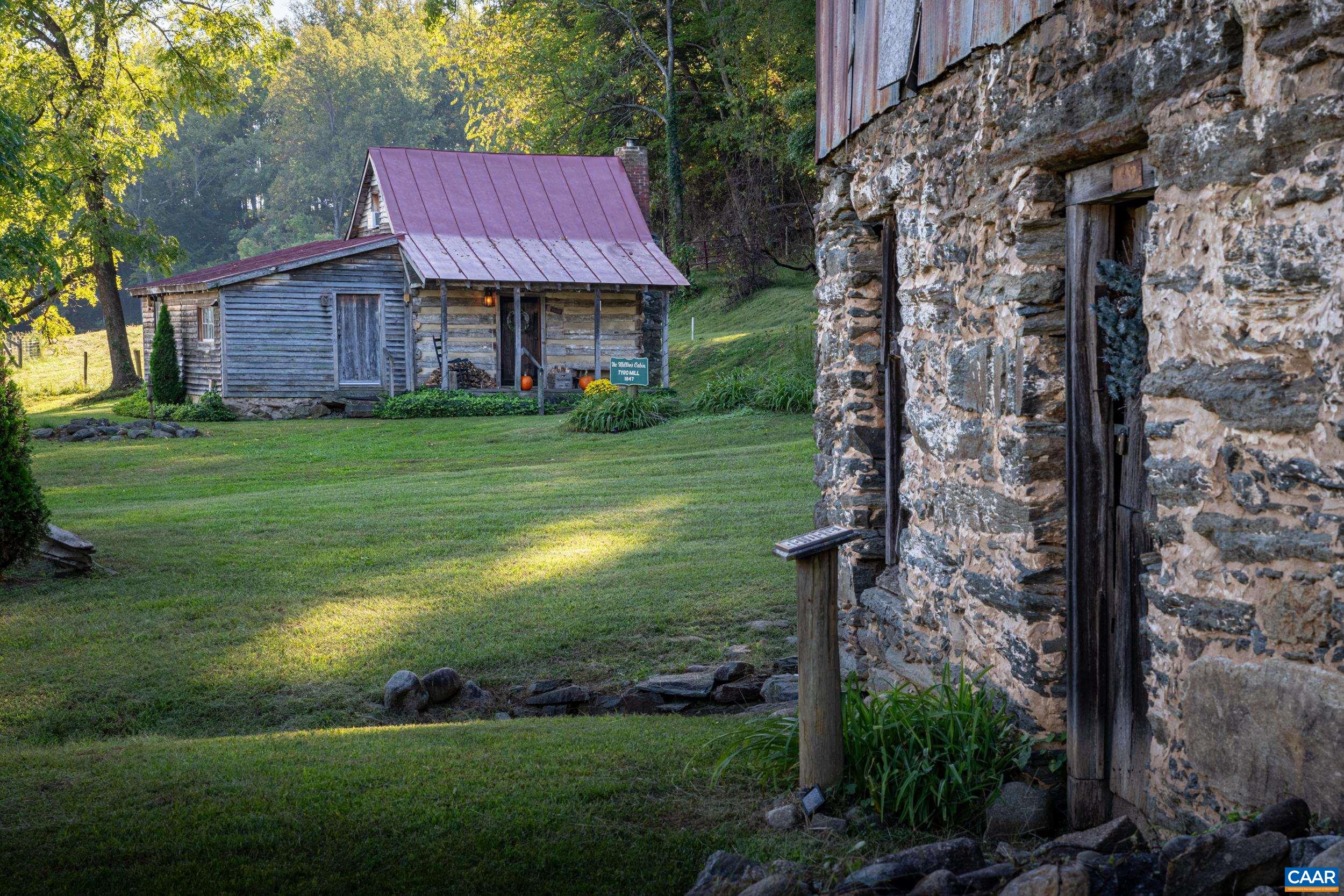 4925 Crabtree Falls Highway Tyro, VA 22976 - Photo 12 of 48 a front view of a house with a garden