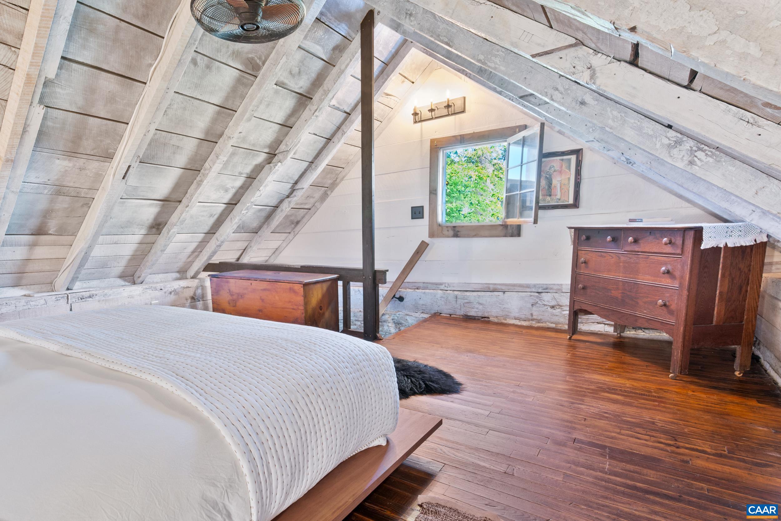 4925 Crabtree Falls Highway Tyro, VA 22976 - Photo 20 of 48 a bedroom with a bed and a window