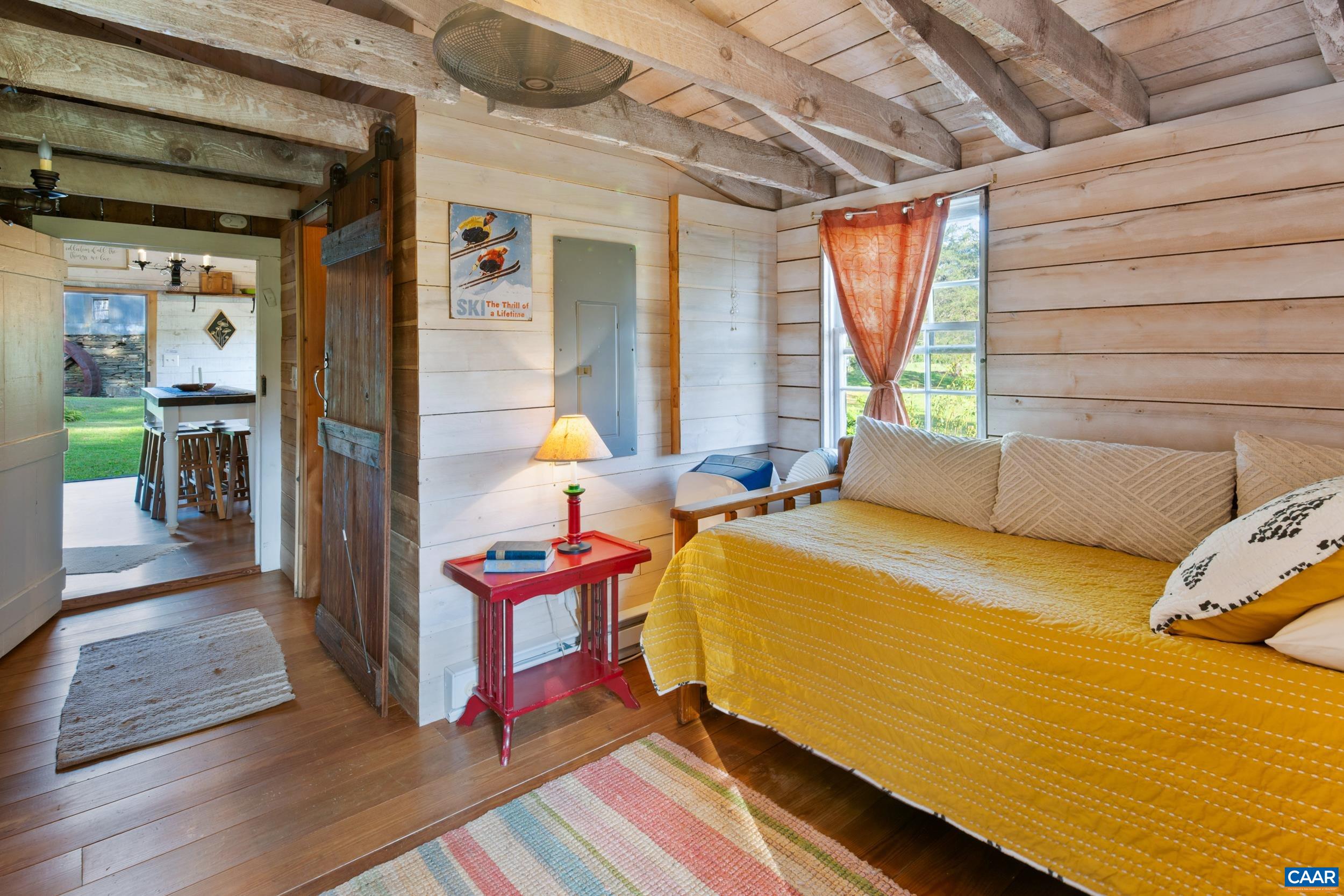 4925 Crabtree Falls Highway Tyro, VA 22976 - Photo 24 of 48 a bedroom with bed and a window