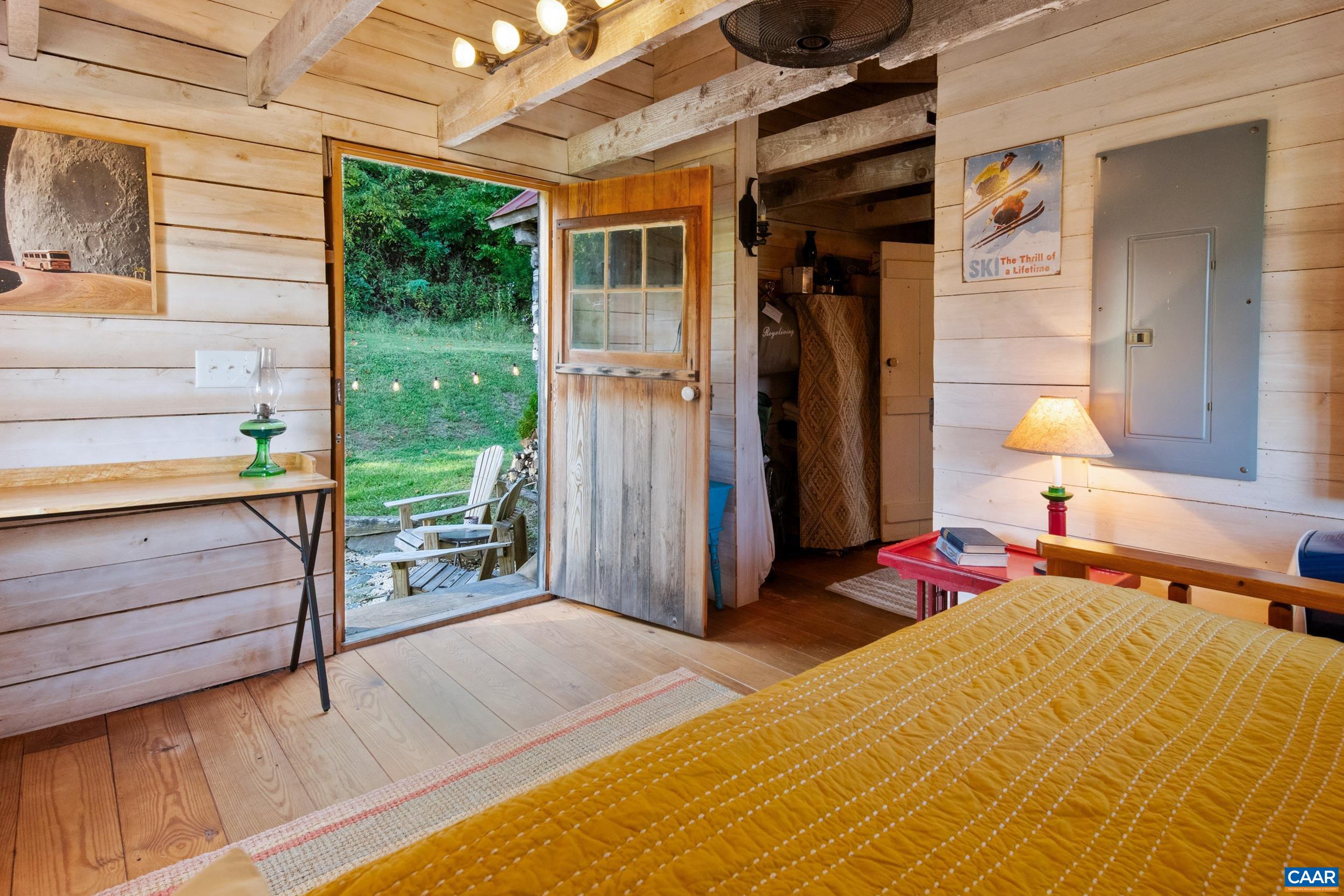 4925 Crabtree Falls Highway Tyro, VA 22976 - Photo 25 of 48 a bed room with a bed and a window