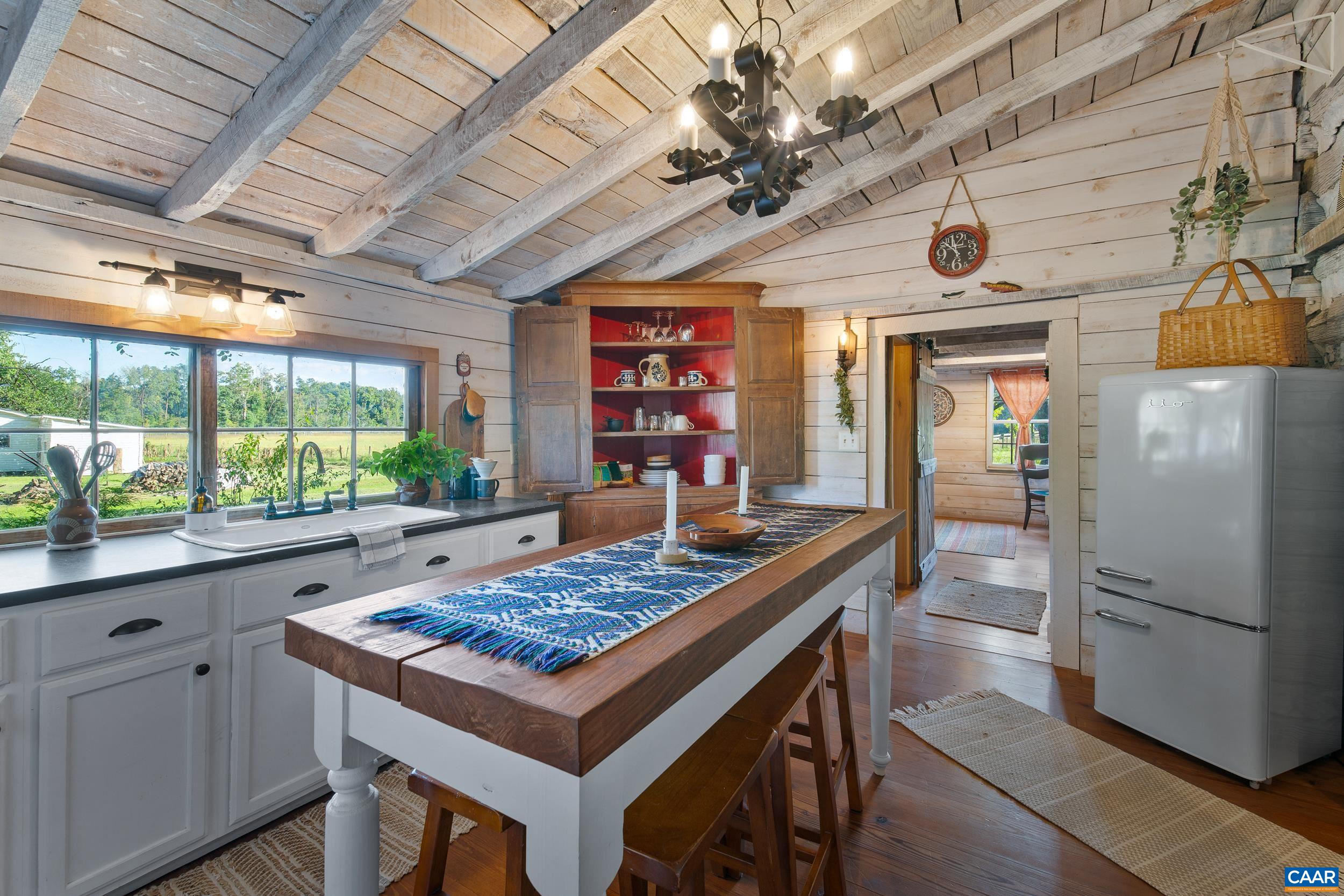 4925 Crabtree Falls Highway Tyro, VA 22976 - Photo 30 of 48 a kitchen with a table and chairs in it