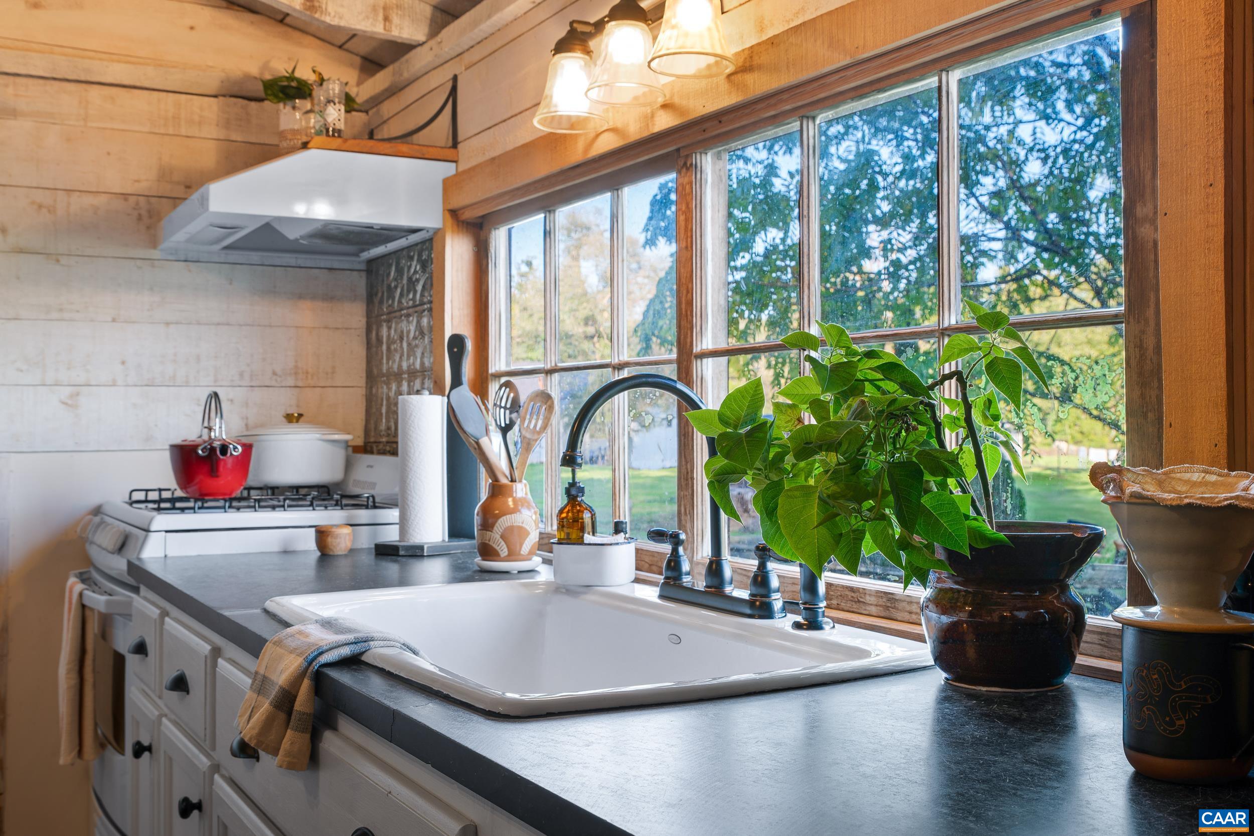 4925 Crabtree Falls Highway Tyro, VA 22976 - Photo 31 of 48 a kitchen with a table and chairs