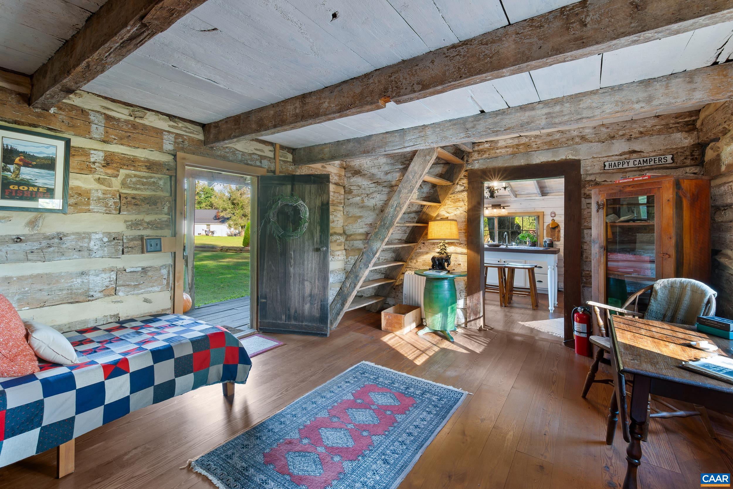 4925 Crabtree Falls Highway Tyro, VA 22976 - Photo 39 of 48 a living room with furniture and a table