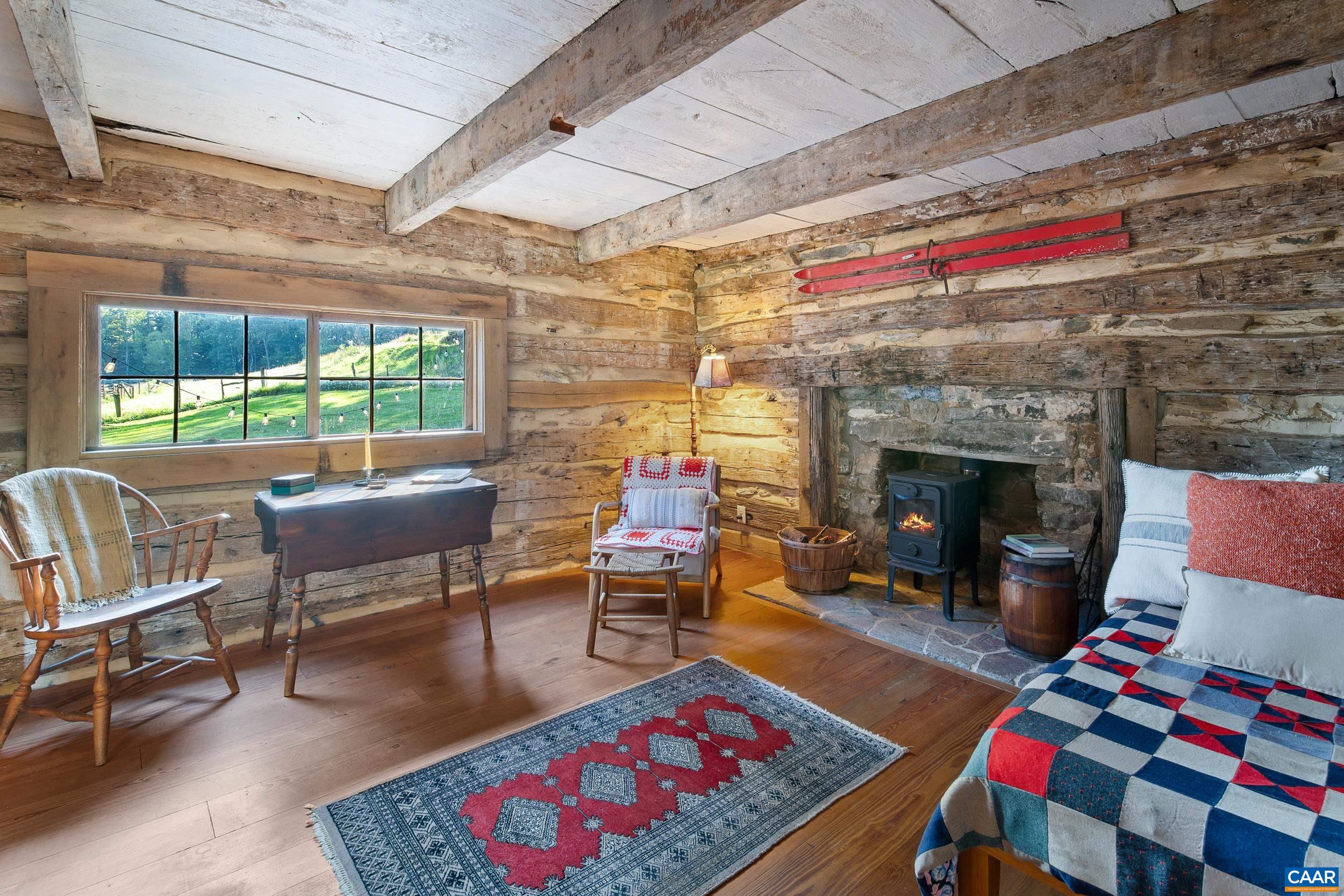 4925 Crabtree Falls Highway Tyro, VA 22976 - Photo 40 of 48 a living room with furniture and a fireplace