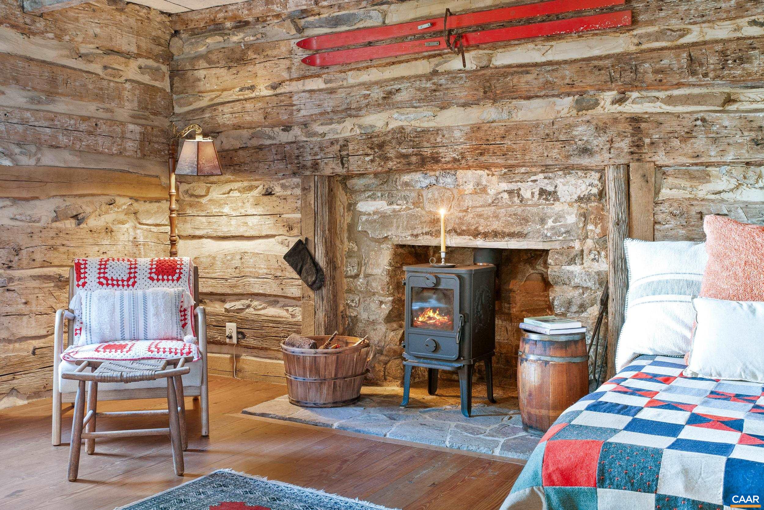 4925 Crabtree Falls Highway Tyro, VA 22976 - Photo 41 of 48 a living room with a couch and a table in it