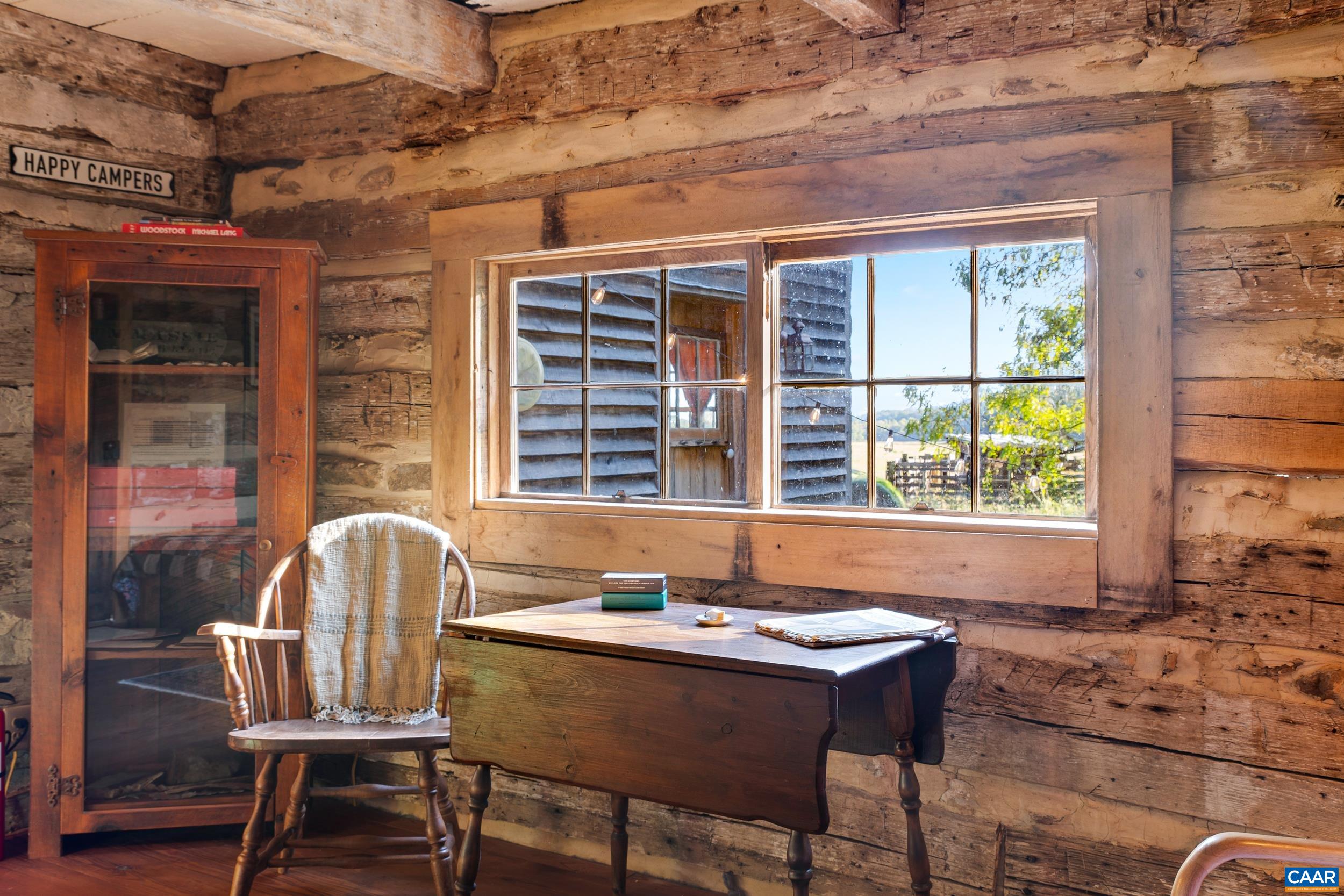 4925 Crabtree Falls Highway Tyro, VA 22976 - Photo 43 of 48 a view of a dining room with furniture window and outside view