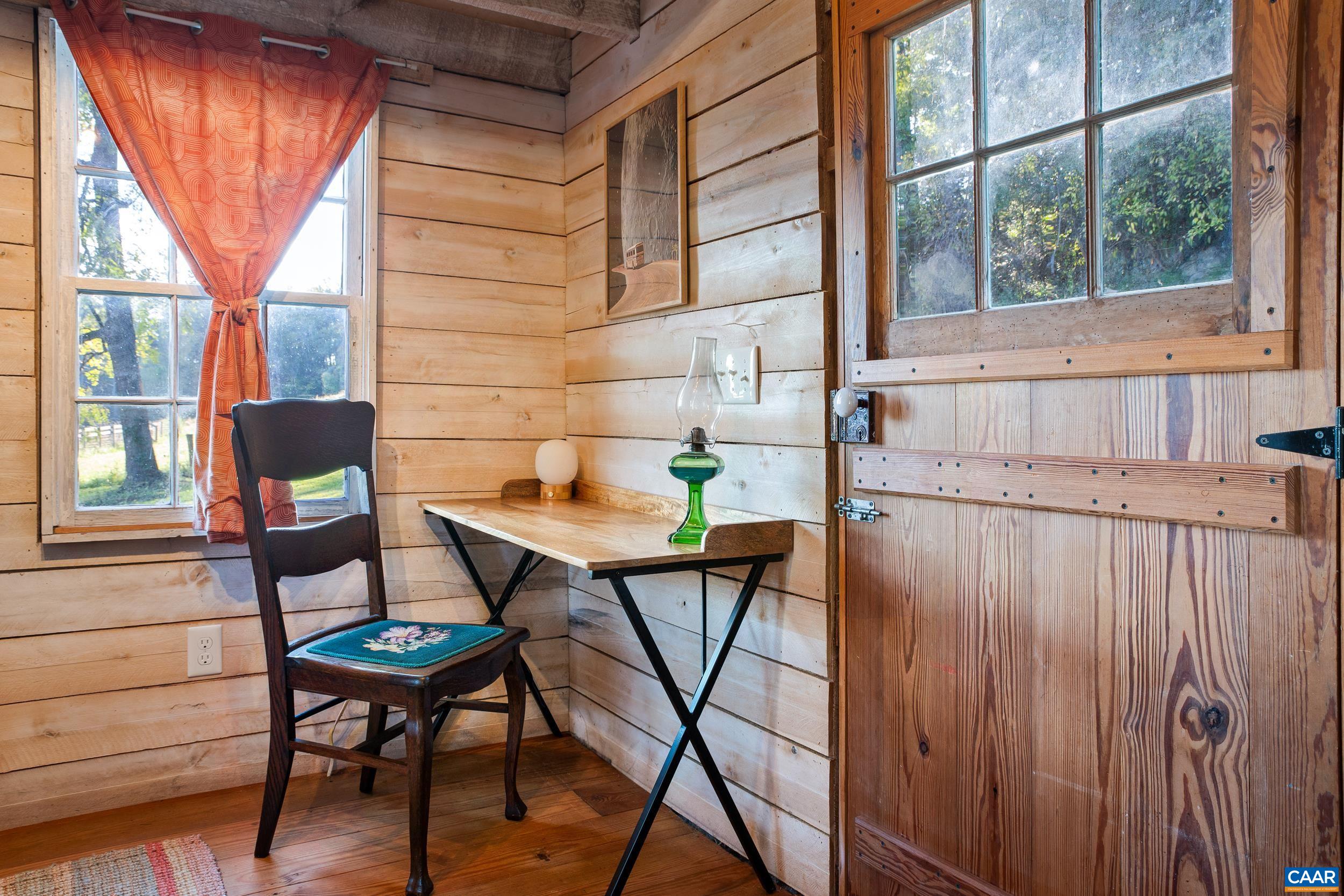 4925 Crabtree Falls Highway Tyro, VA 22976 - Photo 44 of 48 a balcony with table and chairs