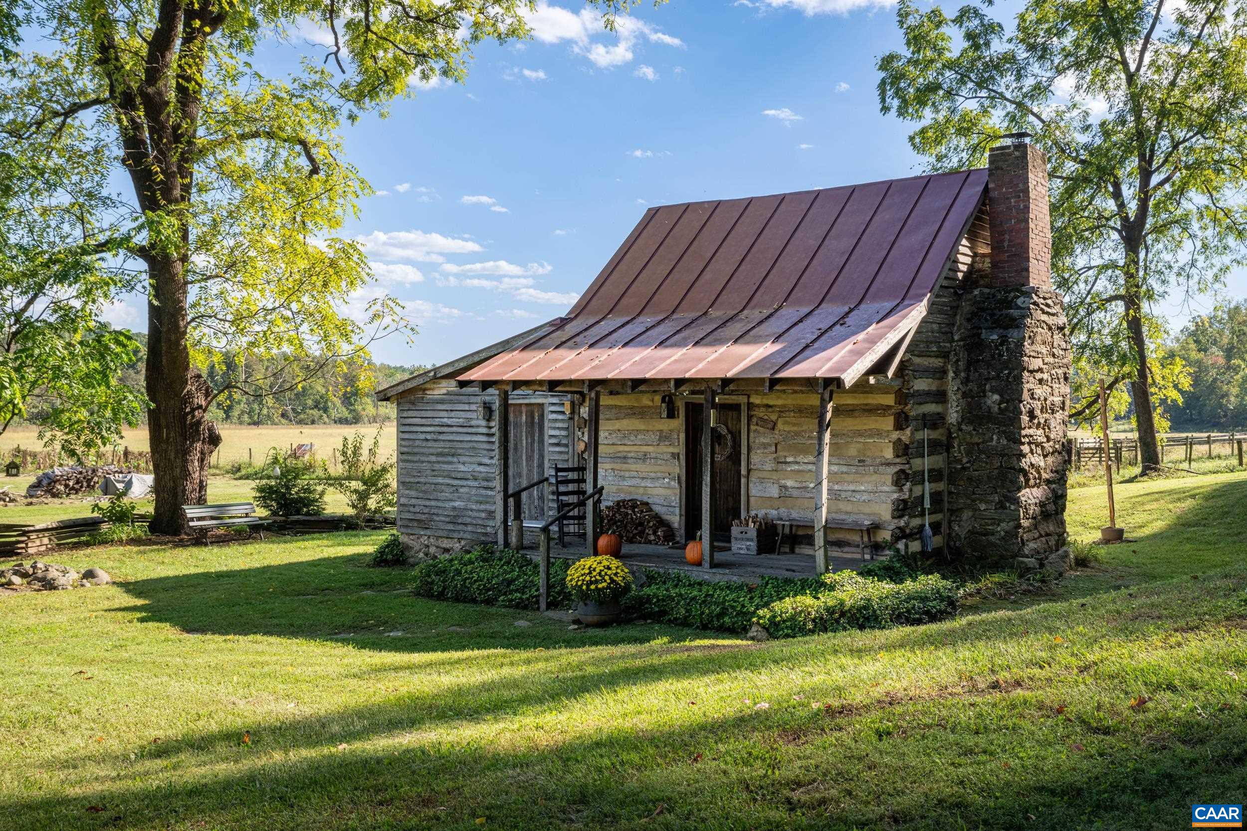 4925 Crabtree Falls Highway Tyro, VA 22976 - Photo 7 of 48 a view of a house with a big yard plants and large trees