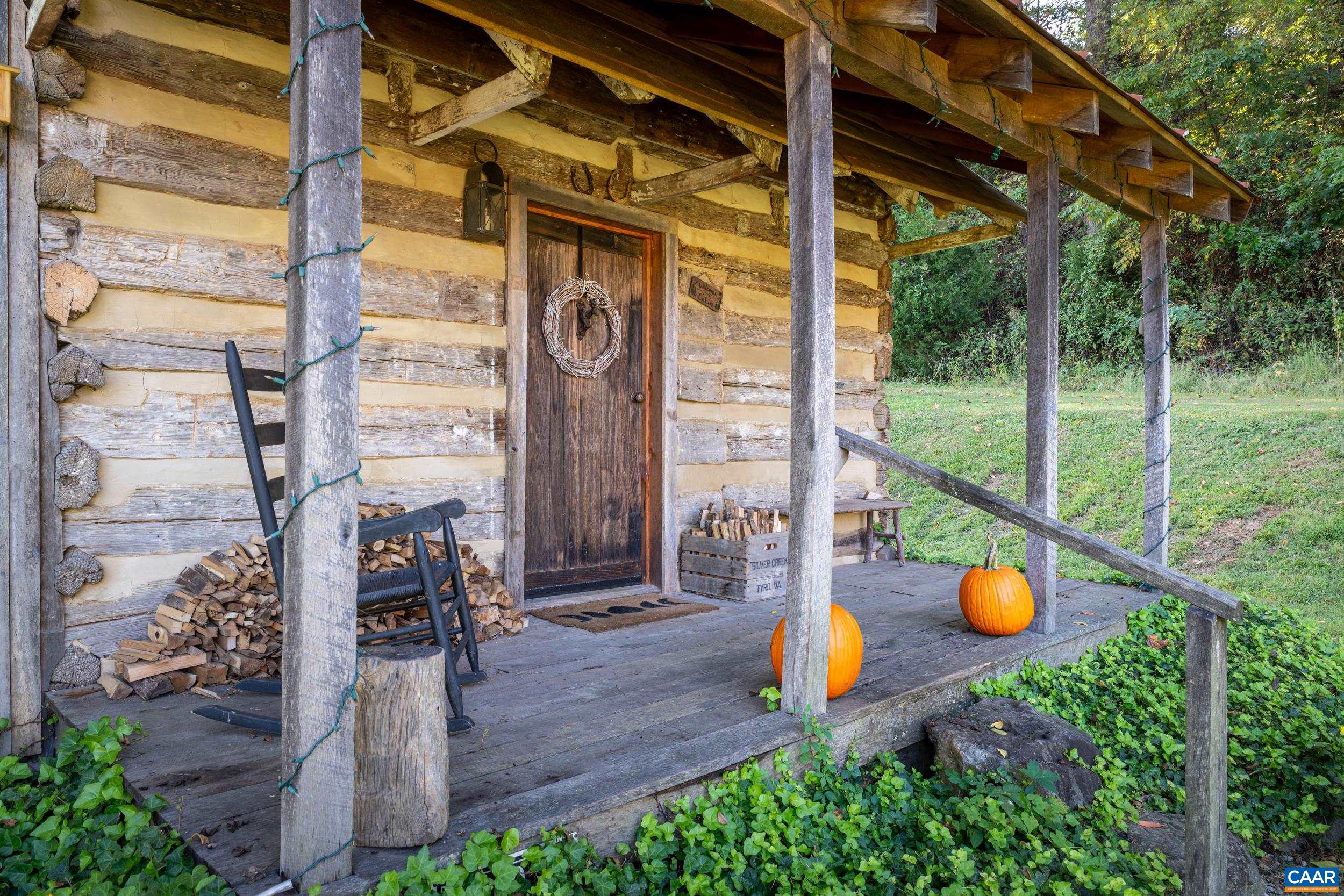 4925 Crabtree Falls Highway Tyro, VA 22976 - Photo 10 of 48 a backyard of a house with seating space