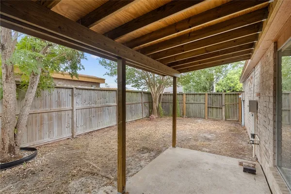 a view of backyard with green space