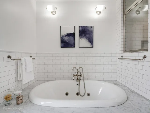 a living room with furniture a rug and a large window