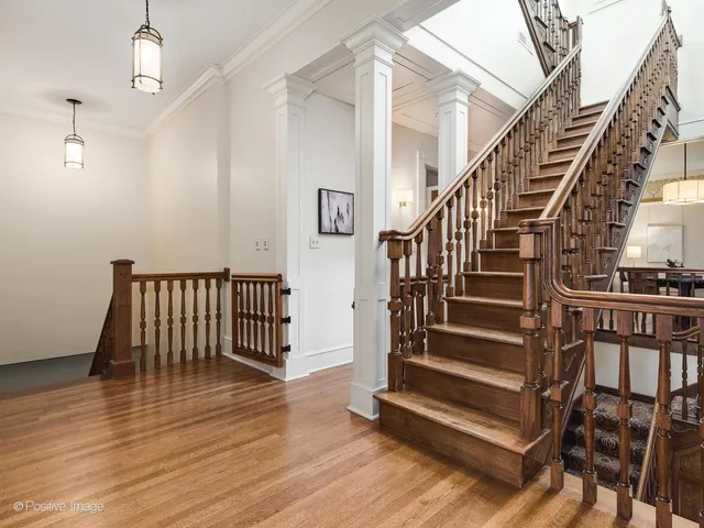 a bathroom with a sink double vanity granite tub shower and a mirror