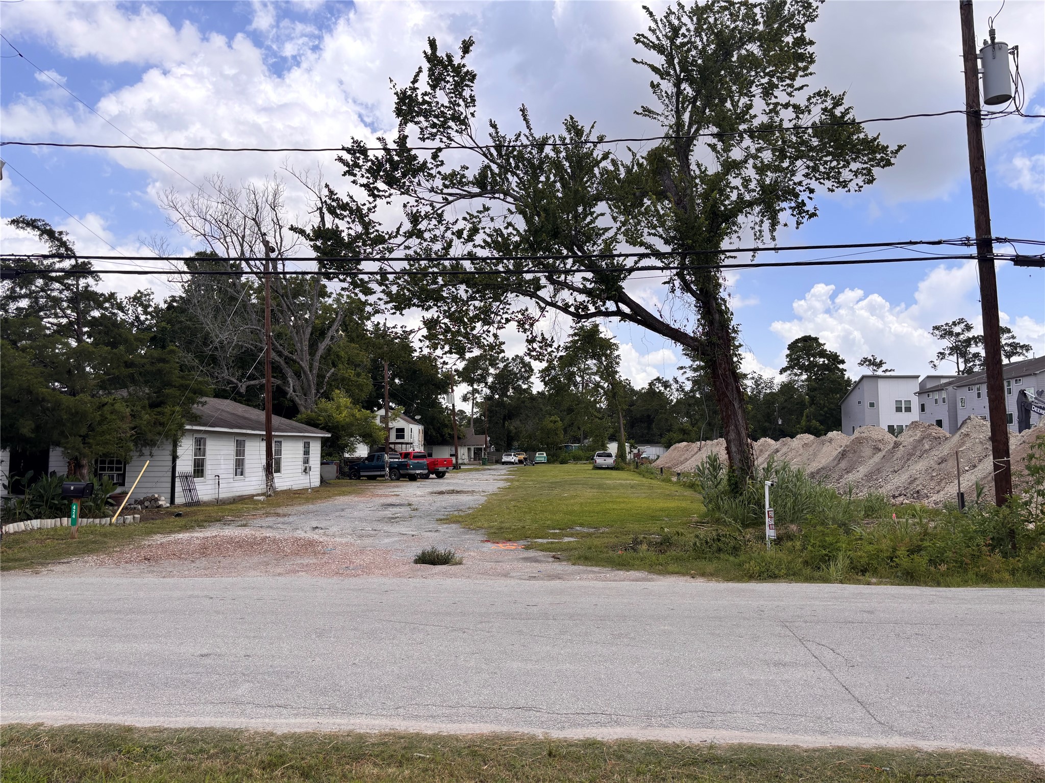 422 Martin Street Houston, TX 77018 - Photo 4 of 6 a street view with residential house and green space