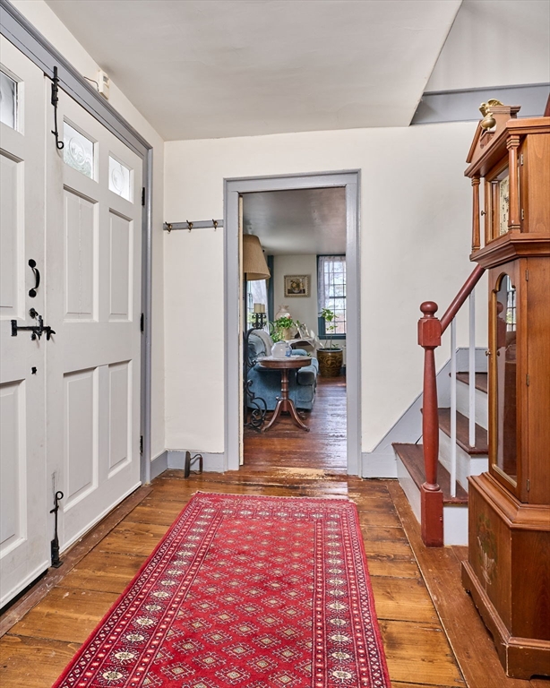 296 Main Street Plainfield, MA 01070 - Photo 22 of 42 a view of a hallway view with living room and wooden floor
