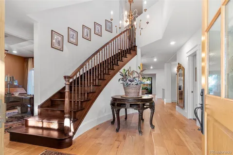 a view of a patio with swimming pool table and chairs