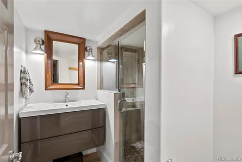 an aerial view of a house with outdoor space