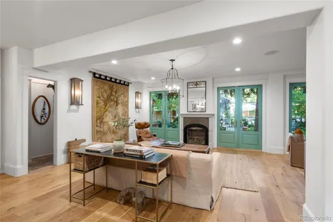 a kitchen with center island table and chairs in it