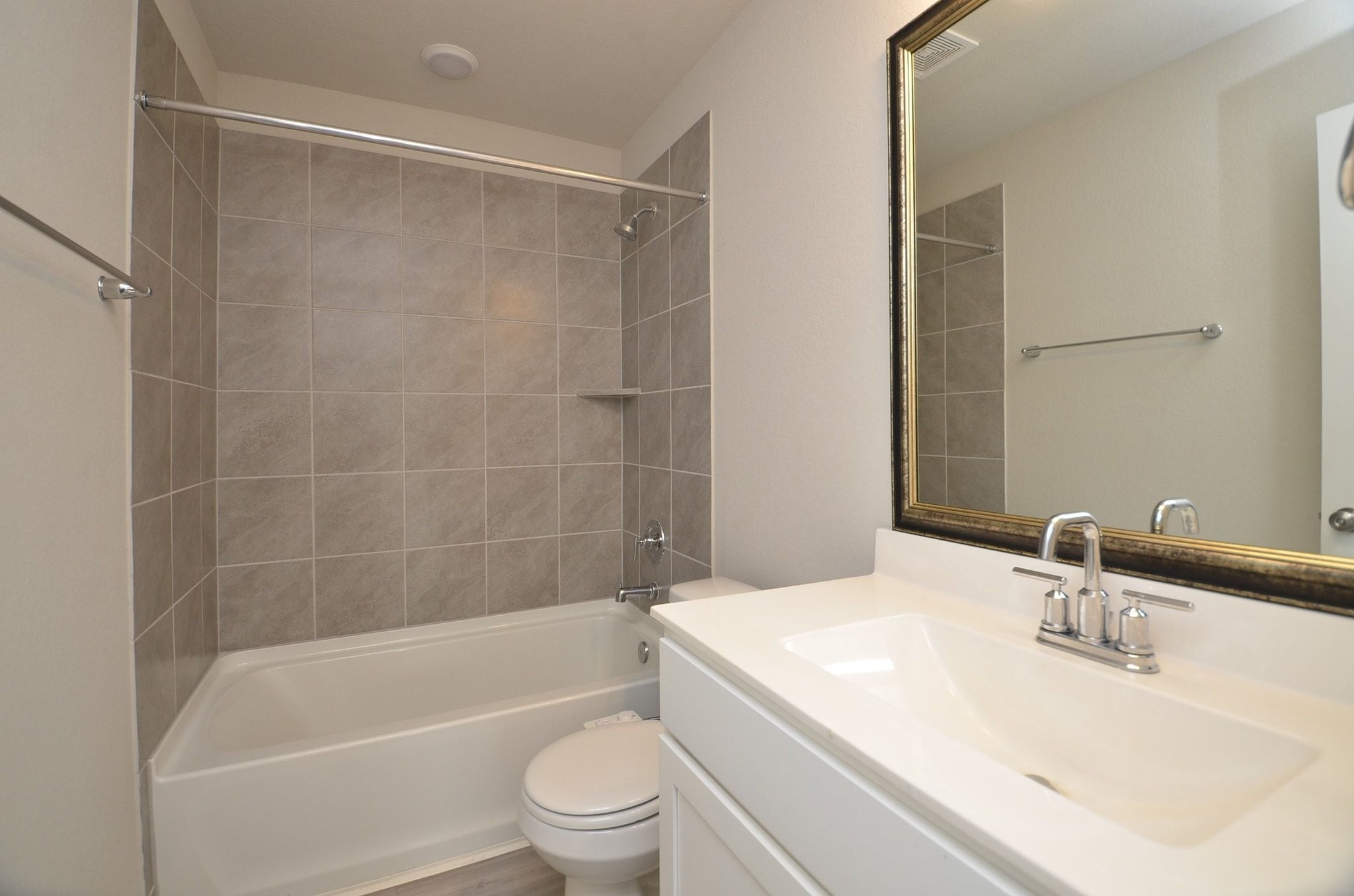8230 Blue Fish Drive Cypress, TX 77433 - Photo 12 of 18 Secondary bathroom has a shower and tub combination and built in Bidet!