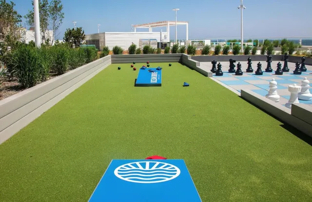 a view of a swimming pool with chairs