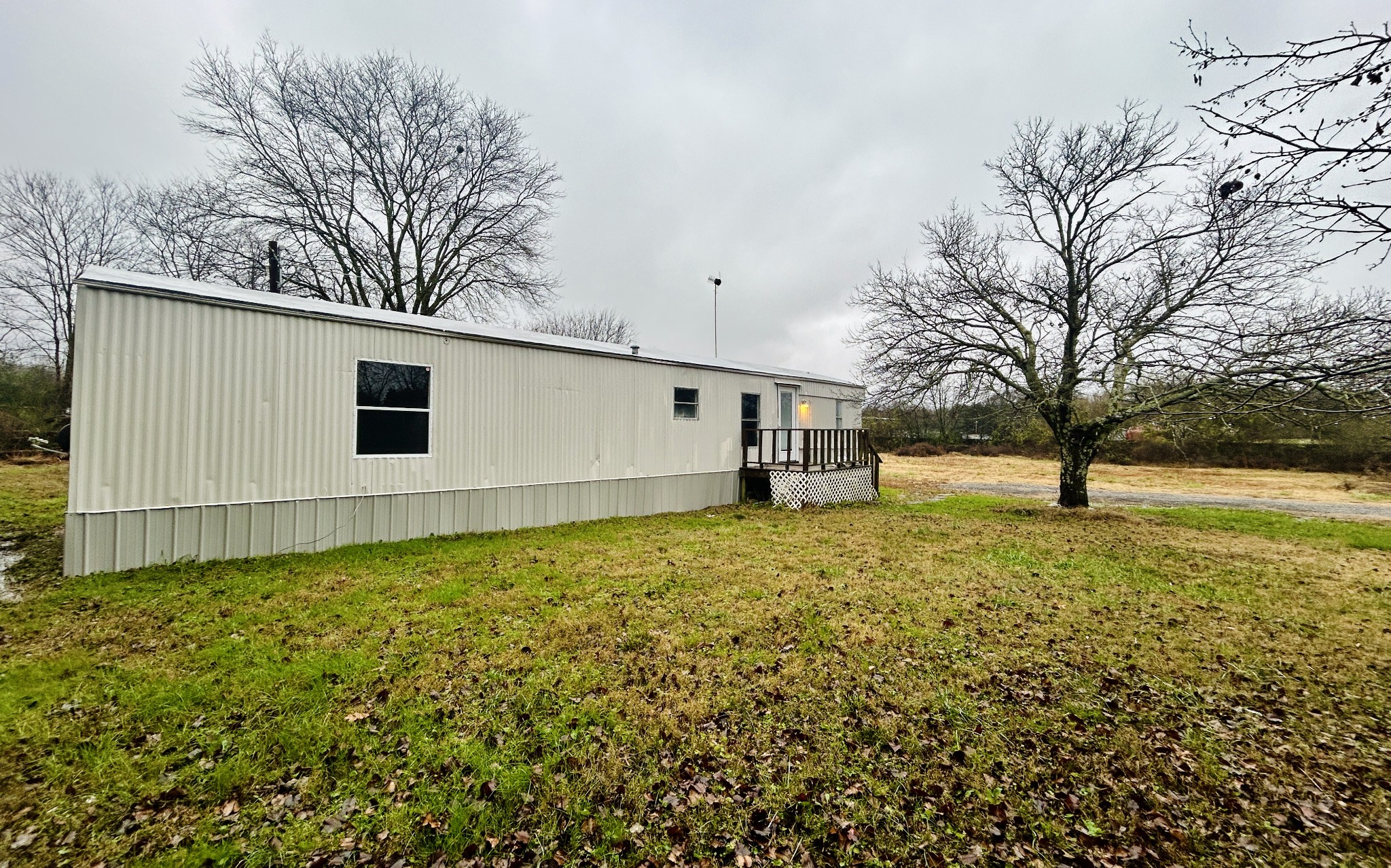 789 Riddle Lane Estill Springs, TN 37330 - Photo 2 of 11 a view of a backyard with large trees