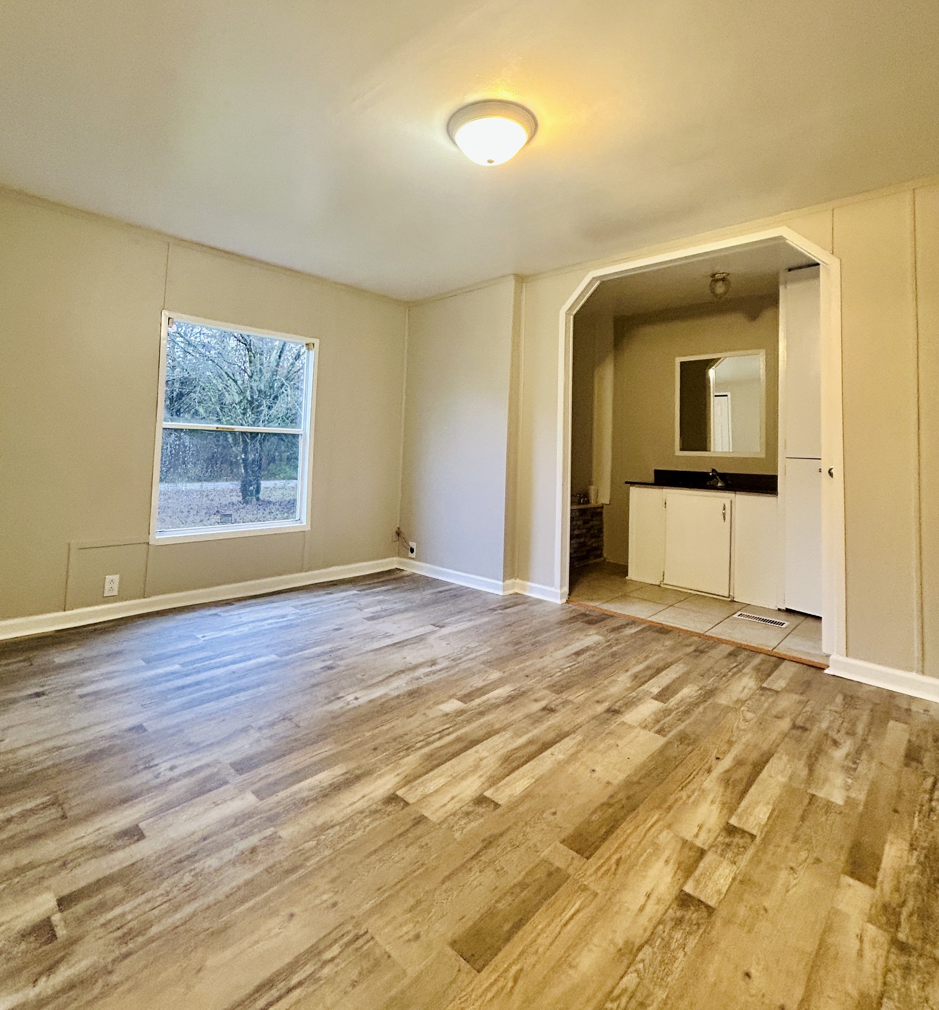 789 Riddle Lane Estill Springs, TN 37330 - Photo 5 of 11 a view of an empty room and window