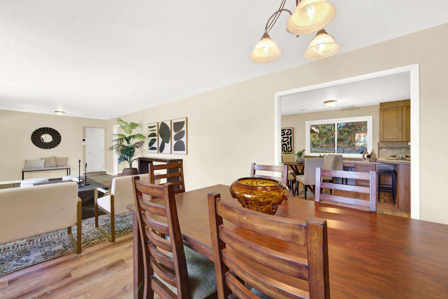 19858 Road 94C Woodland, CA 95695 - Photo 15 of 85 a view of a dining room with furniture window and wooden floor