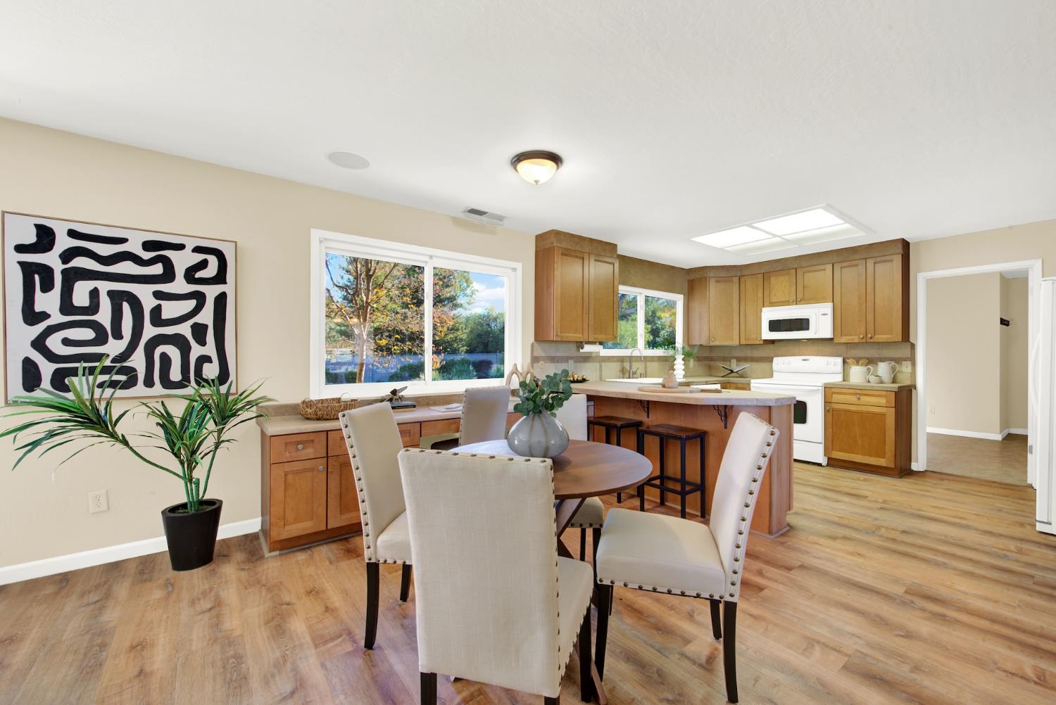 19858 Road 94C Woodland, CA 95695 - Photo 27 of 85 a dining room with furniture and window