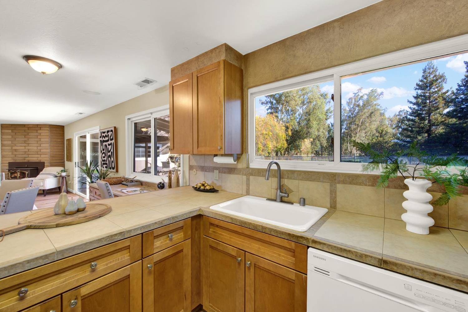 19858 Road 94C Woodland, CA 95695 - Photo 40 of 85 a kitchen with a sink and a large window