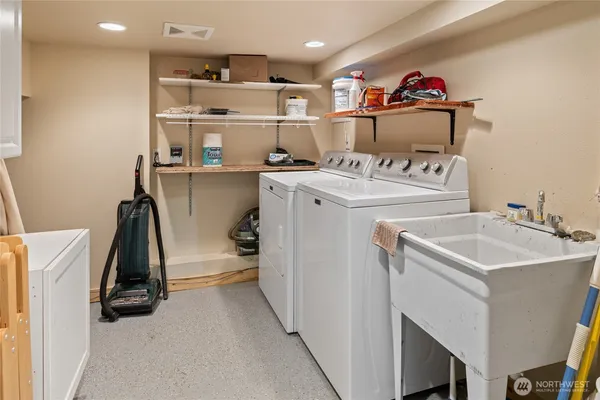 a utility room with dryer and washer