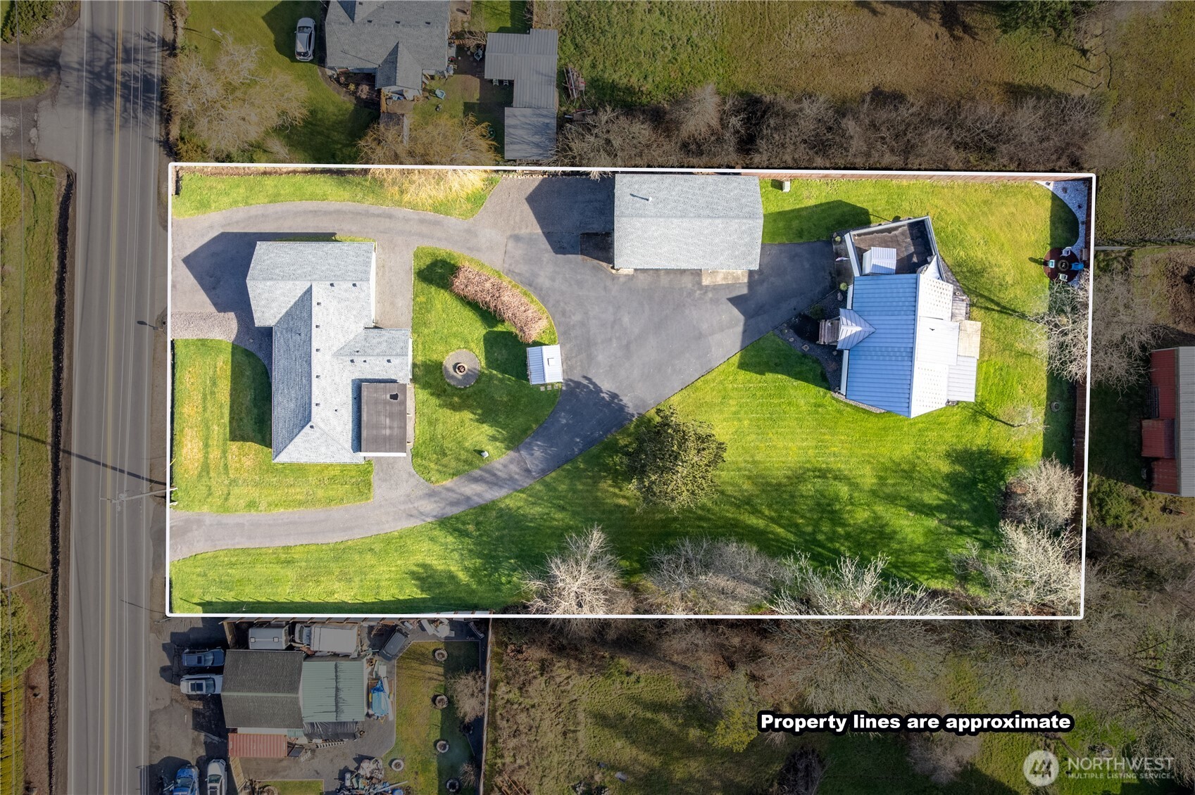 1239 Rose Valley Road Kelso, WA 98626 - Photo 2 of 40 an aerial view of a house with a swimming pool
