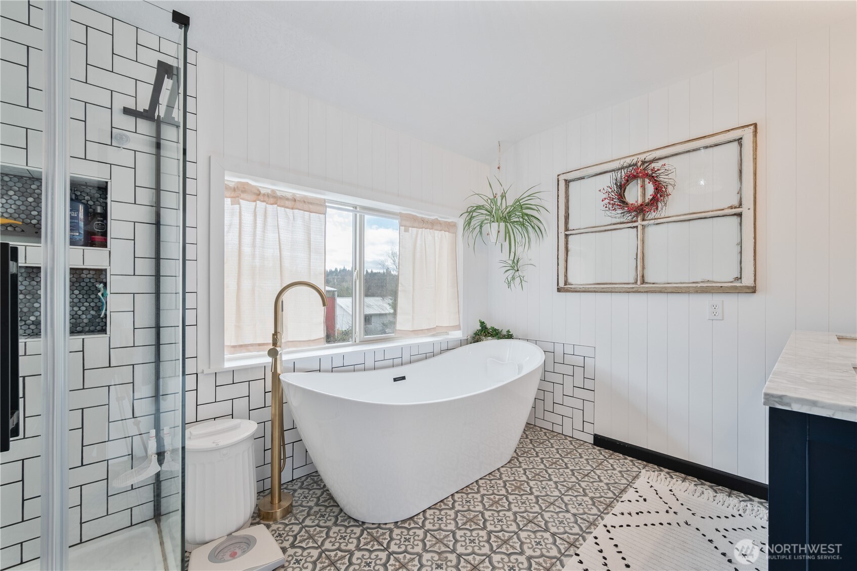 1239 Rose Valley Road Kelso, WA 98626 - Photo 24 of 40 a white bath tub sitting next to a white sink