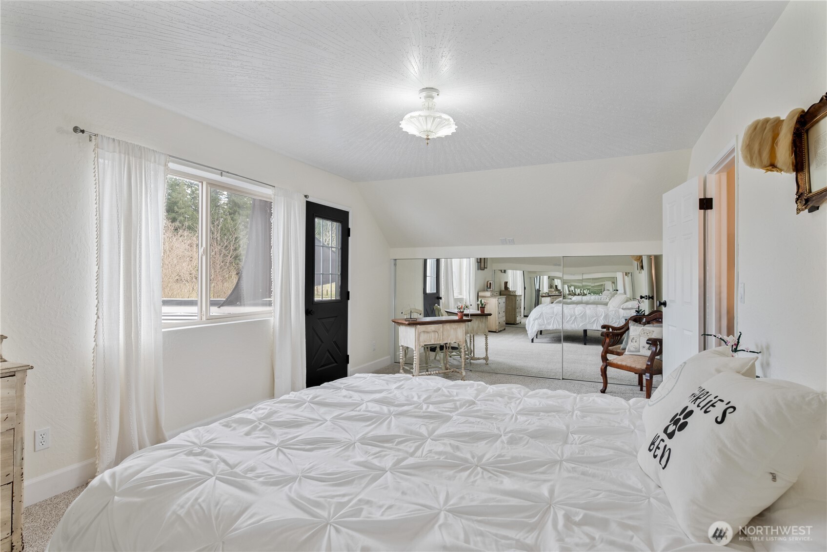 1239 Rose Valley Road Kelso, WA 98626 - Photo 26 of 40 a bedroom with a large bed and a window