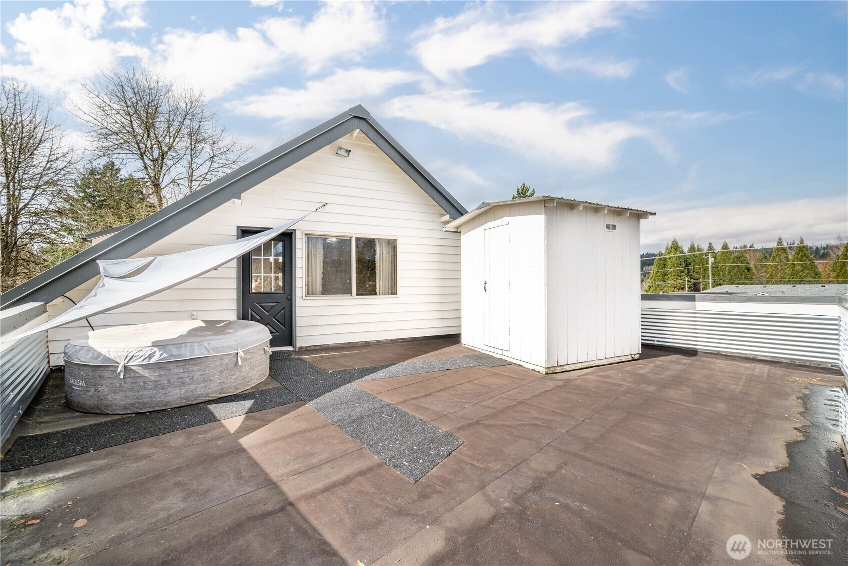 1239 Rose Valley Road Kelso, WA 98626 - Photo 27 of 40 a view of a white house with a large trees