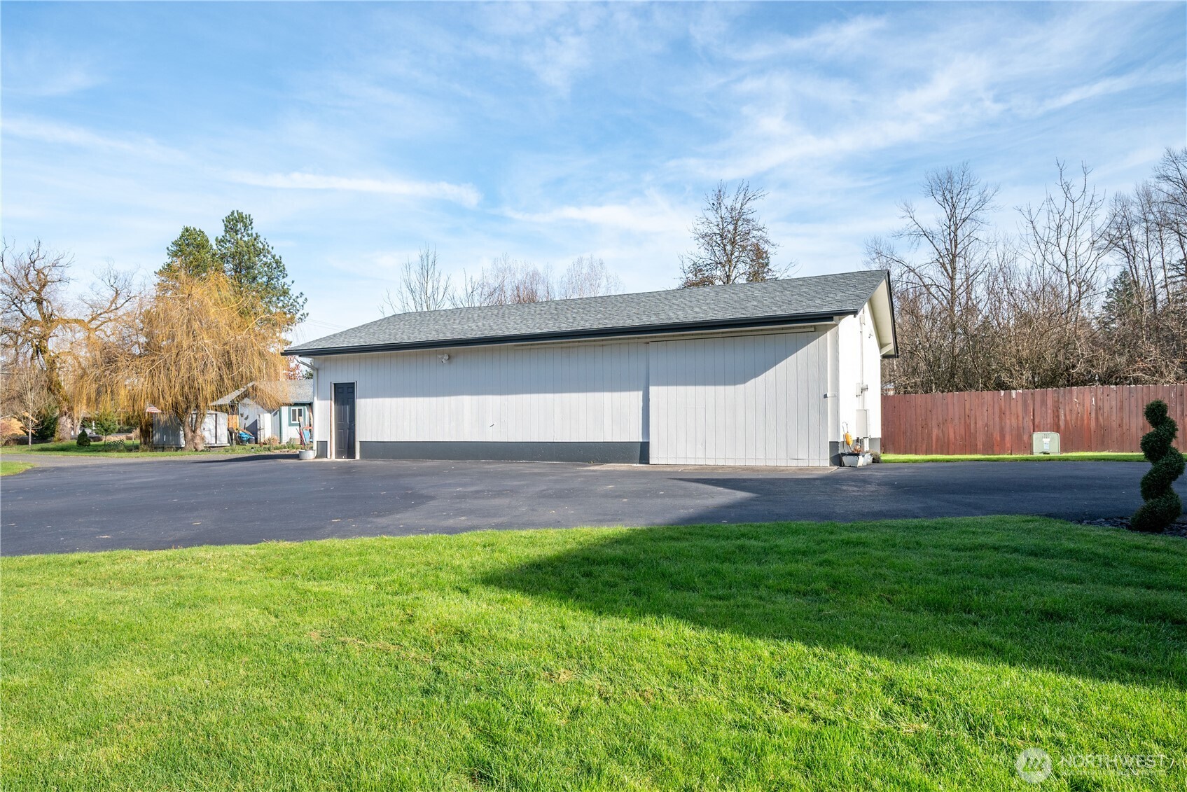1239 Rose Valley Road Kelso, WA 98626 - Photo 29 of 40 a front view of house with yard and trees