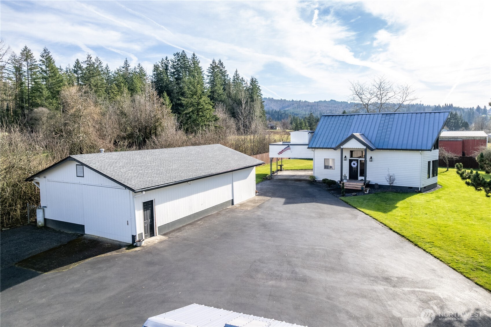 1239 Rose Valley Road Kelso, WA 98626 - Photo 3 of 40 a aerial view of a house with swimming pool and furniture