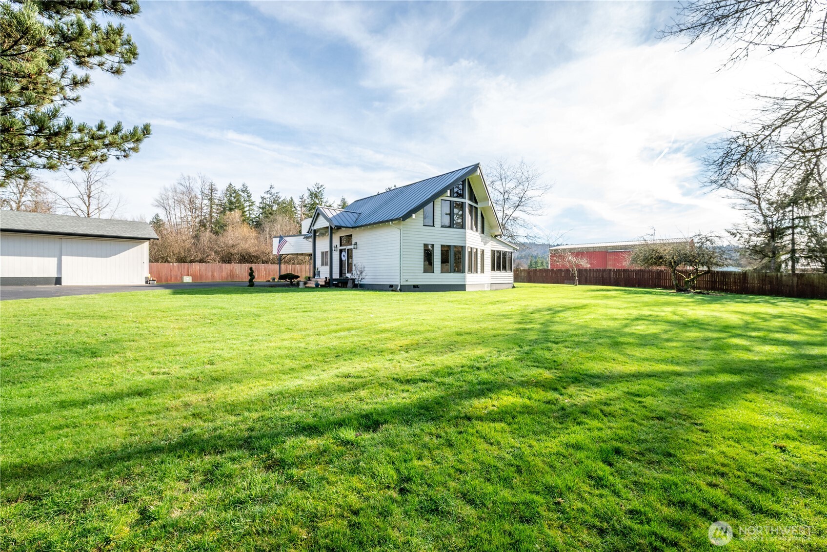 1239 Rose Valley Road Kelso, WA 98626 - Photo 31 of 40 a view of a house with a yard and sitting area