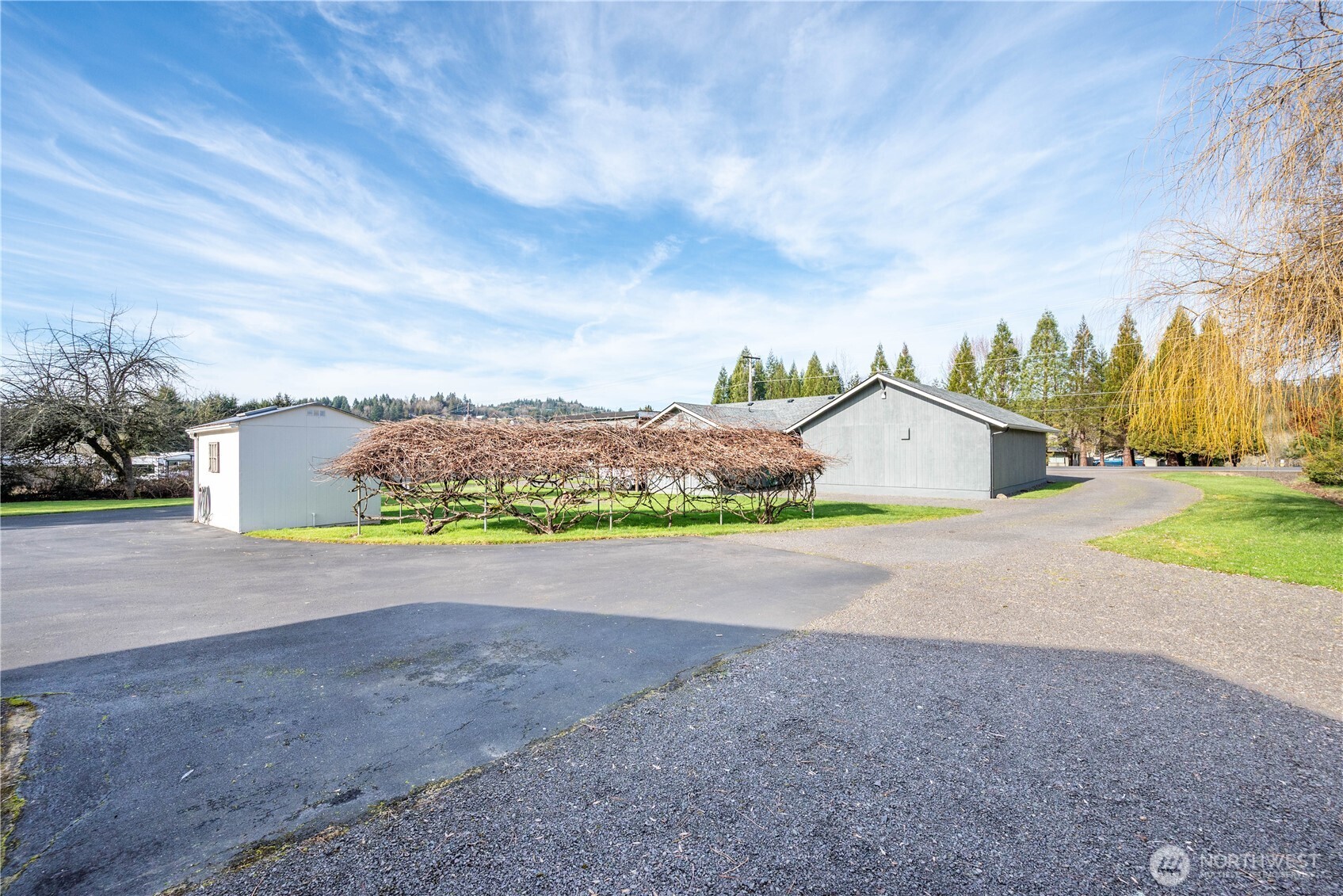 1239 Rose Valley Road Kelso, WA 98626 - Photo 36 of 40 a view of large house with a big yard and large trees