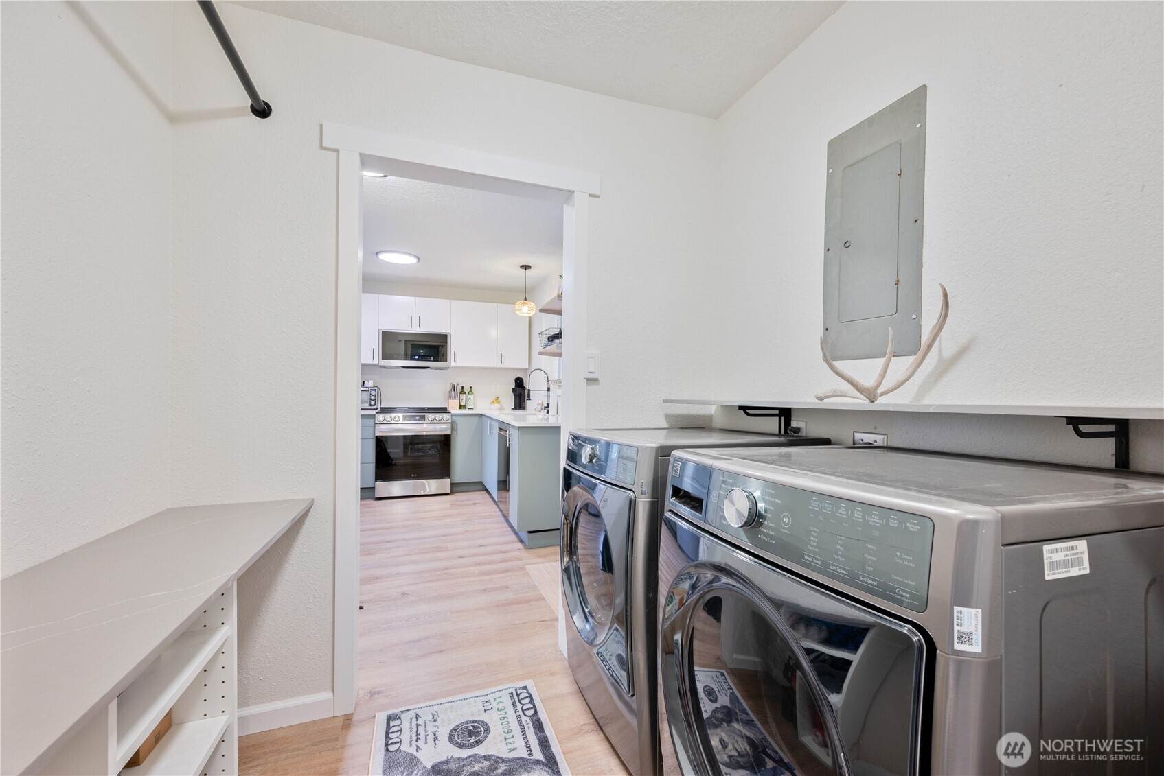 1239 Rose Valley Road Kelso, WA 98626 - Photo 39 of 40 a view of a kitchen with a sink wooden floor and a window