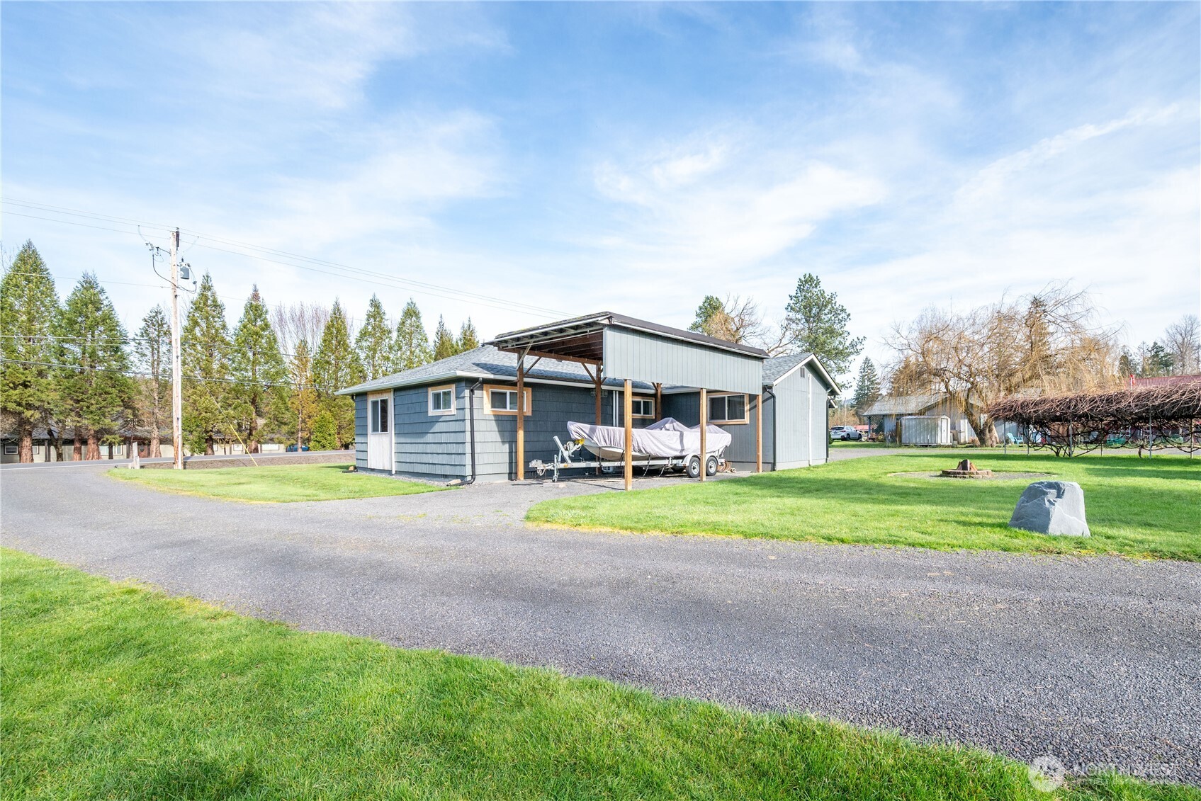1239 Rose Valley Road Kelso, WA 98626 - Photo 40 of 40 a view of a house with a yard and sitting area