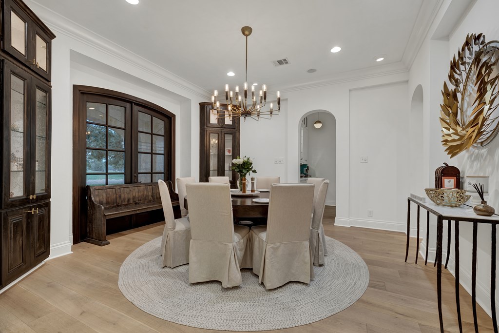2975 Bear Creek Road Fredericksburg, TX 78624 - Photo 11 of 53 a dining room with furniture a livingroom and chandelier