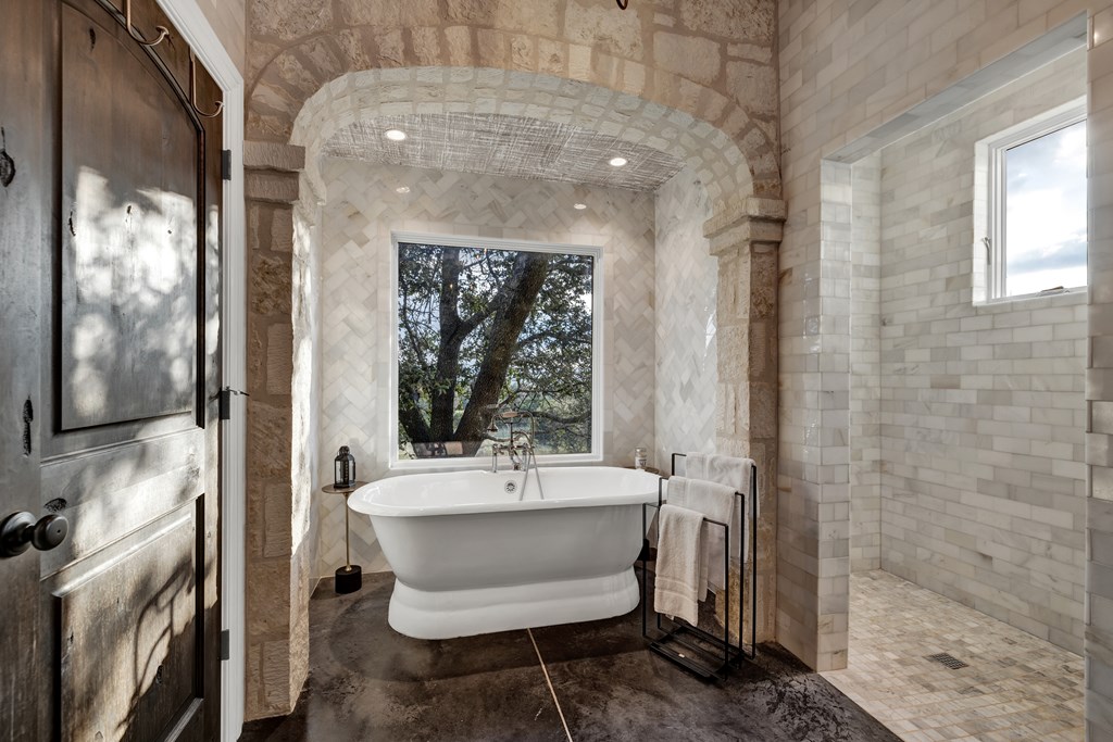 2975 Bear Creek Road Fredericksburg, TX 78624 - Photo 19 of 53 a bathroom with a sink and a mirror