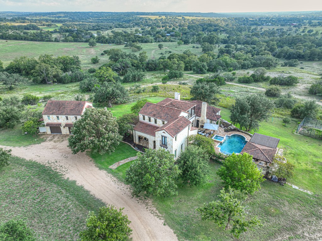 2975 Bear Creek Road Fredericksburg, TX 78624 - Photo 3 of 53 an aerial view of a house with outdoor space and street view