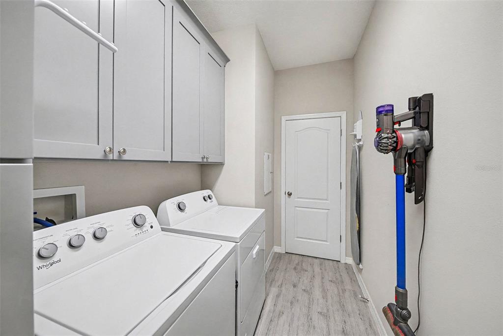 14902 Caravan Avenue Odessa, FL 33556 - Photo 12 of 40 a utility room with dryer and washer
