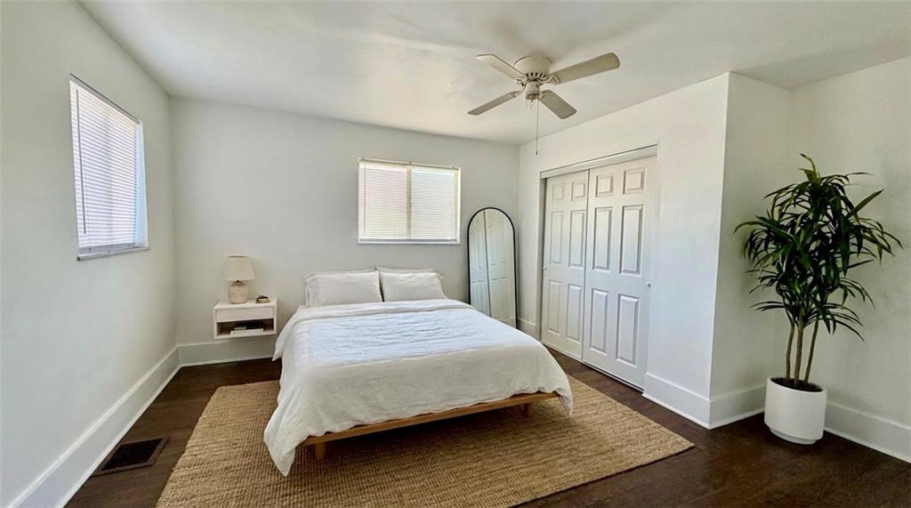 641 Garfield Street Springdale, PA 15144 - Photo 20 of 44 a bedroom with a bed table flowerpot and window