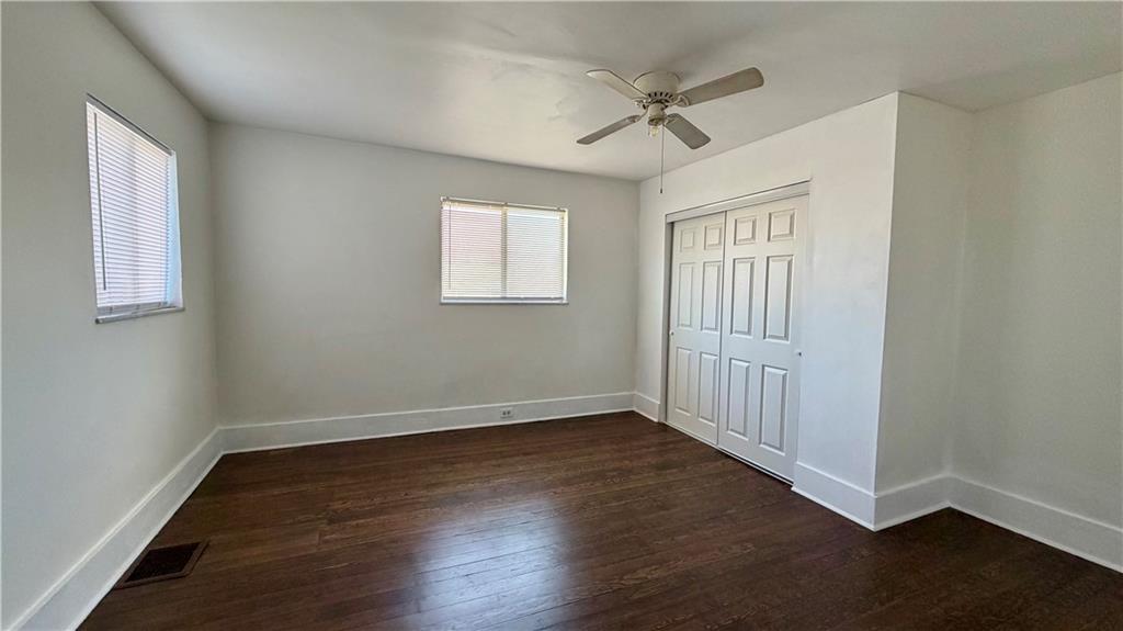 641 Garfield Street Springdale, PA 15144 - Photo 21 of 44 wooden floor in an empty room with a window