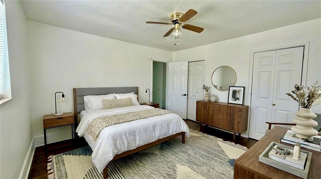 641 Garfield Street Springdale, PA 15144 - Photo 24 of 44 a bedroom with a bed a chandelier and dresser