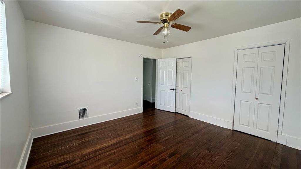 641 Garfield Street Springdale, PA 15144 - Photo 25 of 44 a view of room with hardwood floor and ceiling fan