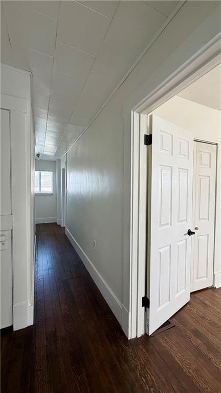 641 Garfield Street Springdale, PA 15144 - Photo 28 of 44 a view of a hallway with wooden floor