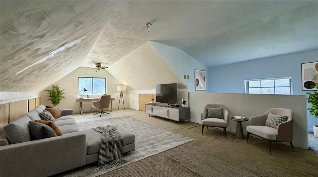 641 Garfield Street Springdale, PA 15144 - Photo 29 of 44 a living room with furniture and a couch